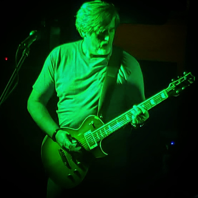 Man playing the electric guitar