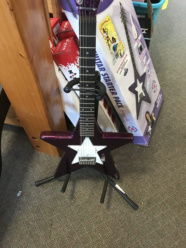 A star shaped electric guitar.