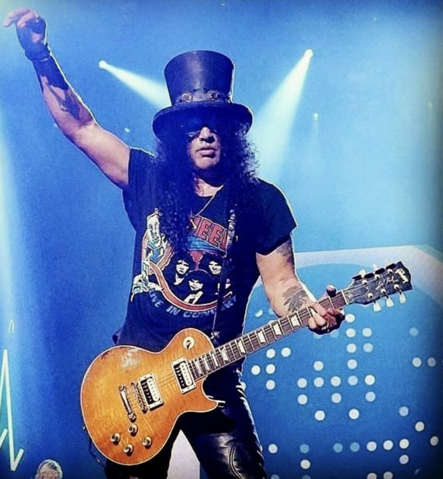 Slash playing a Les Paul guitar