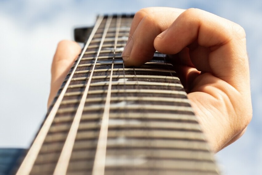 Playing guitar