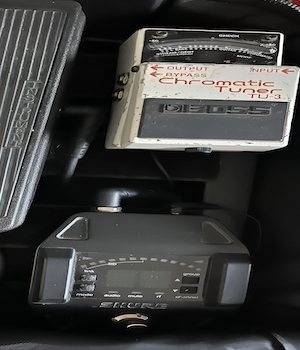 Boss tuner pedal on a pedalboard
