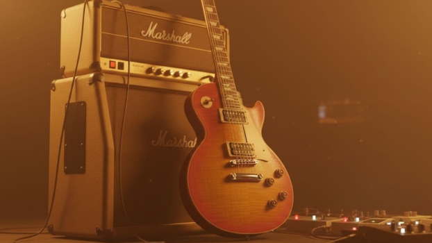 Close up of an electric guitar and amplifier with warm lighting representing professional rock tone mastery.